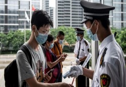 بكين تغلق 10 أحياء إضافية مع تسجيل 36 إصابة جديدة