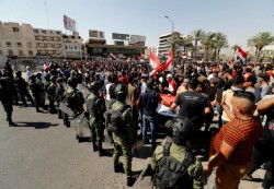 صدامات بين محتجين عراقيين والقوات الأمنية في "التحرير" ومقتل متظاهر