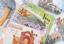 انهيار جديد للعملة.. سوريا تخفض سعر الصرف الرسمي لليرة